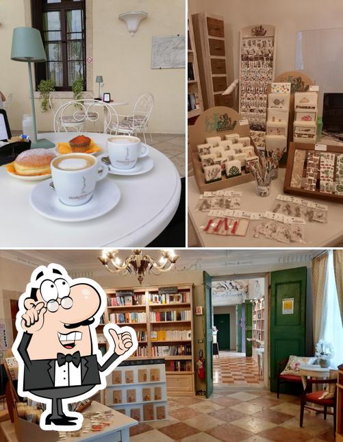 Dai un'occhiata agli interni di Libreria Caffè Cuore D'Inchiostro