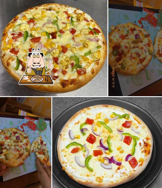 Pick pizza at MYRA CAFE & RESTRO