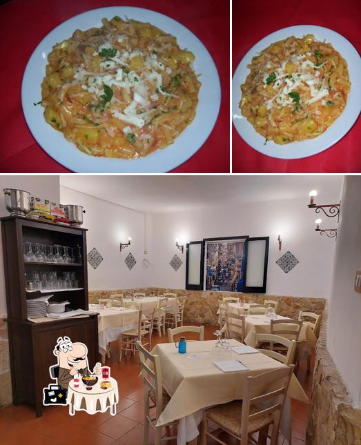 Tra le varie cose da Trattoria e Pizzeria Taverna Masaniello via donnalbina 28 80134 Napoli si possono trovare la cibo e interni