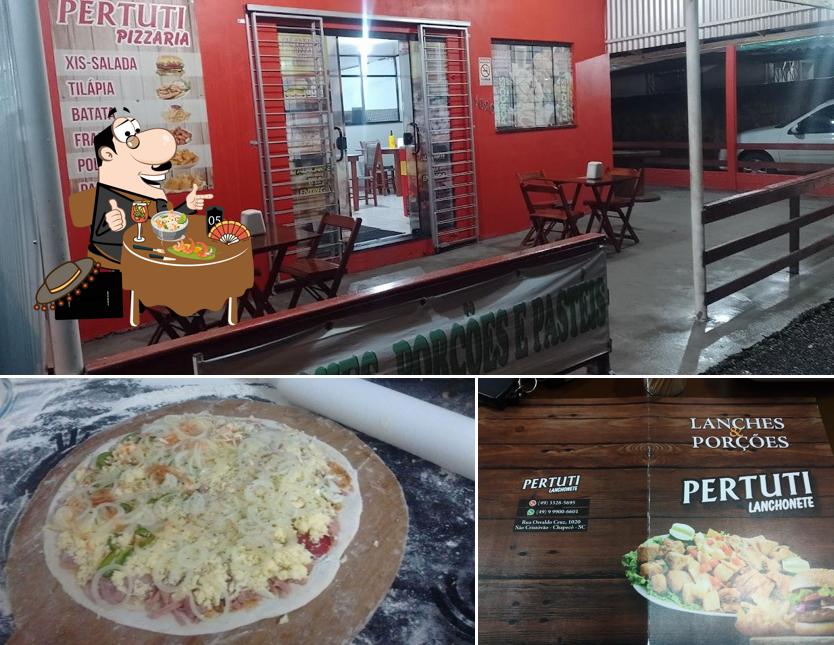 O Pizzaria Pertuti se destaca pelo comida e interior