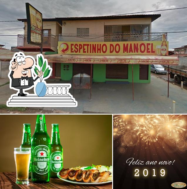 Dê uma olhada a foto mostrando exterior e cerveja no Espetinho do Manoel