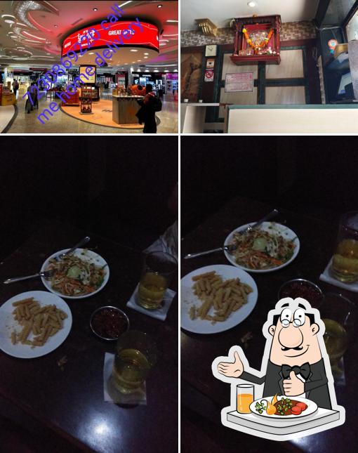 Take a look at the image showing food and interior at Deepak Bar And Restaurant