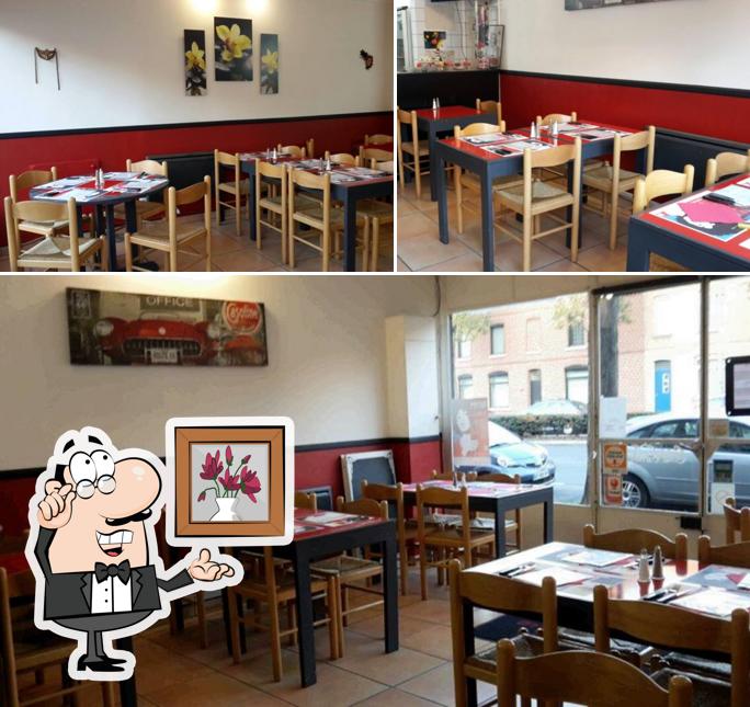 Installez-vous à l'une des tables de Pizza Gambetta