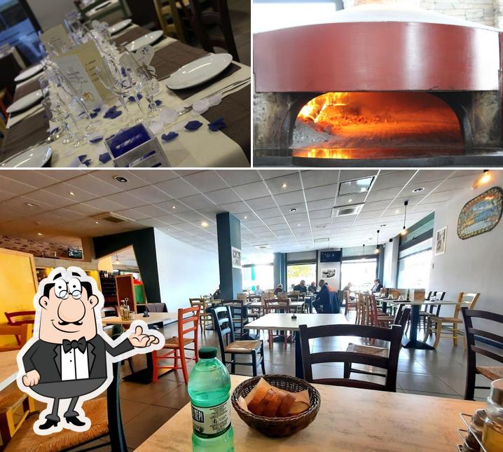 FRANK'S PIZZA RISTORANTE BAR si caratterizza per la interni e tavolo da pranzo