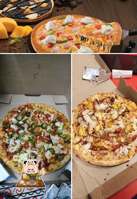 Try out pizza at Dominos Pizza