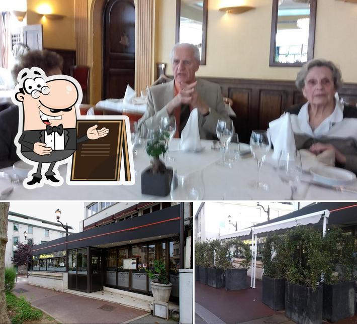 La photo de la extérieur et table à manger de Le Pressoir’s