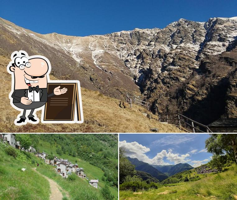 Puoi goderti l'aria fresca da seduto all'esterno di Alpe Premaniga