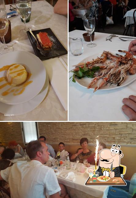La immagine della cibo e tavolo da pranzo di Trattoria da Nadae