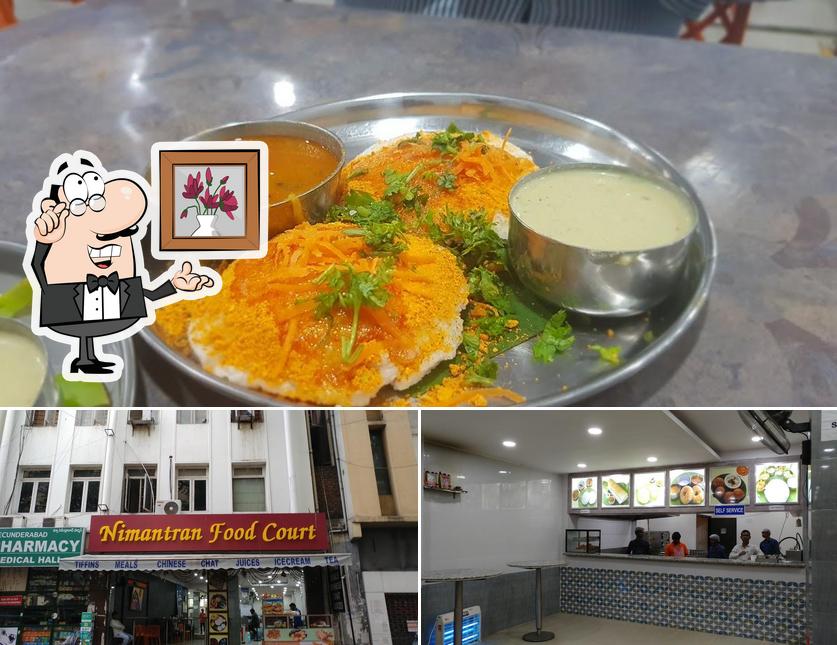 Among various things one can find interior and food at Nimantran Restaurant