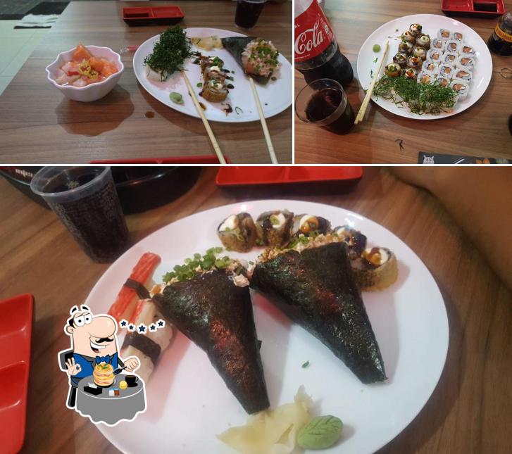 Esta é a imagem mostrando comida e cerveja no Fukurō Sushi Bar
