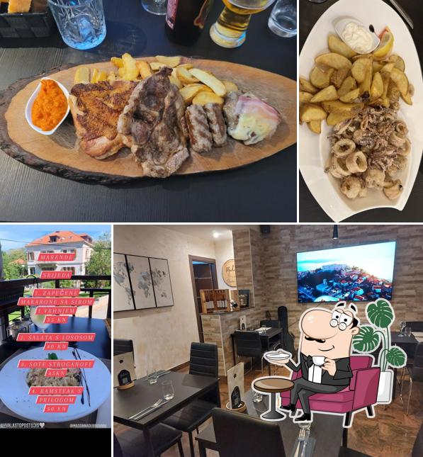 Siediti a un tavolo di Restoran Madonna