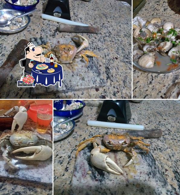 Peça diversos itens de frutos do mar oferecidos no Malagueta Guaimum