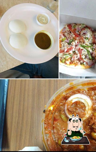 This is the photo showing food and interior at Kanha Sweets & Restaurant