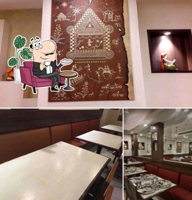 Take a seat at one of the tables at Panchavati Gaurav