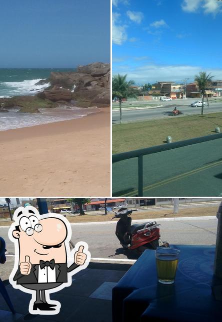 Look at this image of Garota da Praia