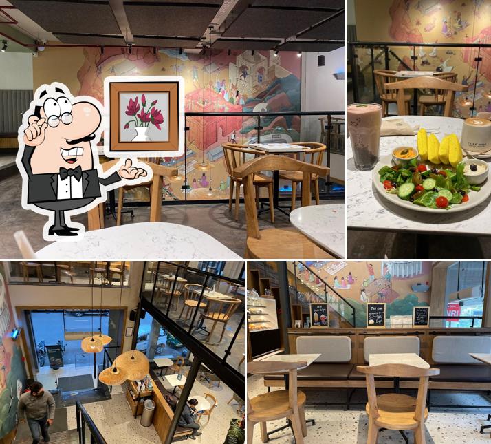 Take a seat at one of the tables at Third Wave Coffee