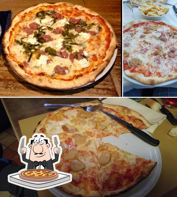 Scegli una pizza a Pizzeria Birreria Roma Di Grigis Fabio