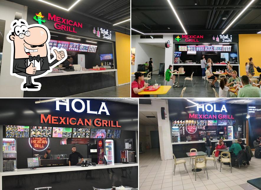 Это снимок ресторана "Hola Mexican Grill"