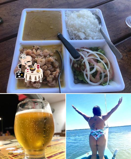 A foto da comida e cerveja no O Rey da Moqueca 5 Estrelas