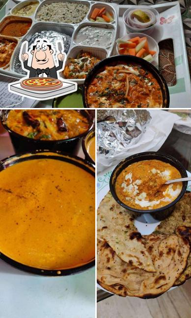 At The Gourmet's - Authentic Indian Cuisine, you can order pizza