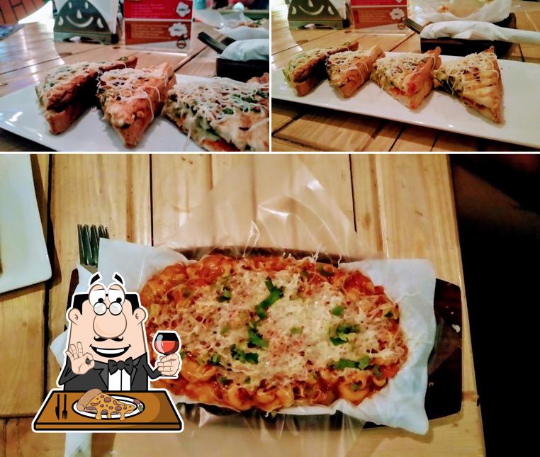 Try out pizza at Cafe Pluto