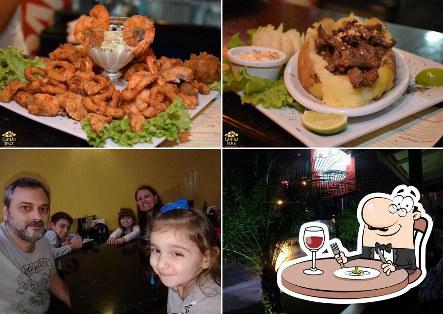 Comida em Capitão Space Pizzaria Batataria Porções Confraternização Restaurante Música ao vivo