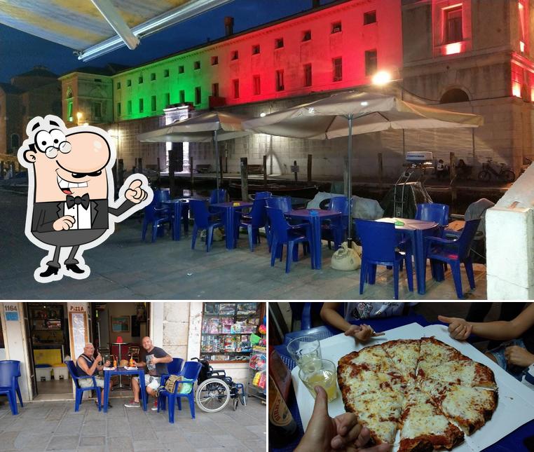 Dai un’occhiata alla immagine che raffigura la interni e pizza di "Al Batelo" Bar Pizzeria