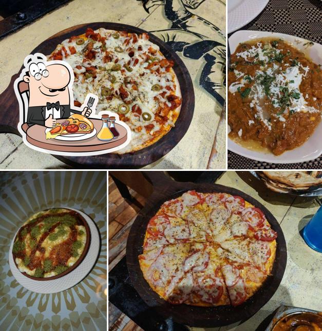 Get pizza at Khidmat