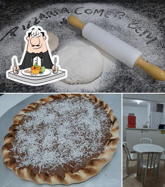 O Pizzaria Comer Bem se destaca pelo comida e interior