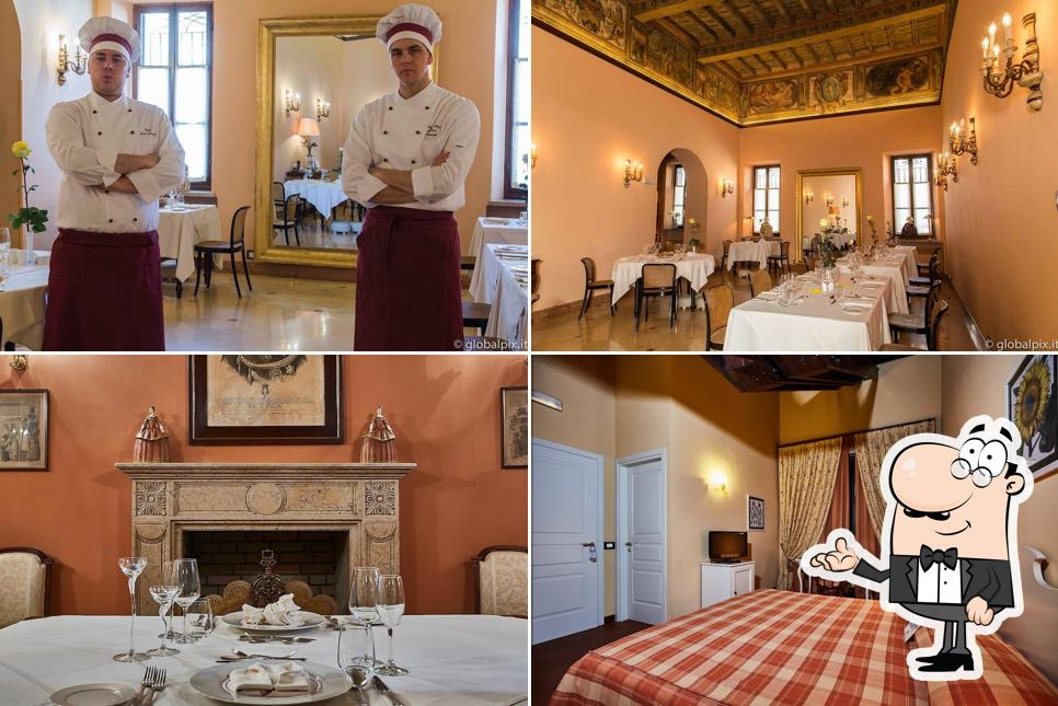 Siediti a un tavolo di Hotel Albergo Trattoria Il Leone