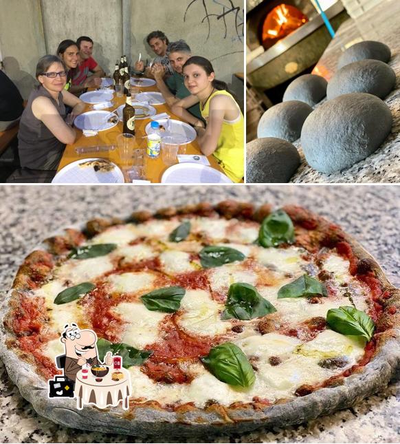 La immagine di cibo e tavolo da pranzo da Ciak Pizza
