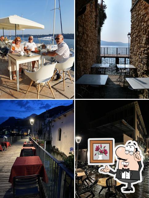 Siediti a un tavolo di Ristorante Pizzeria al Lago