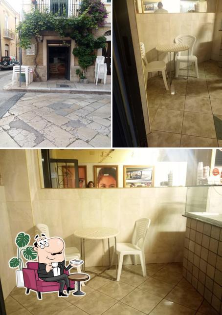 Voici la photo représentant la intérieur et extérieur sur Pizzeria Leccese