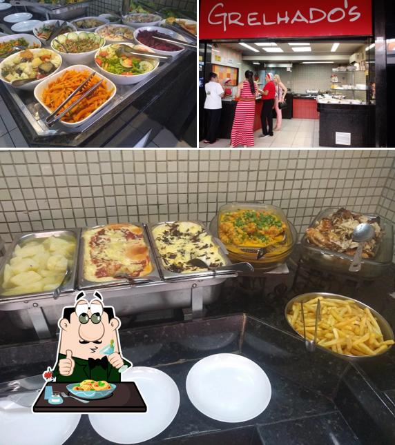 A foto do Grelhado's’s comida e interior