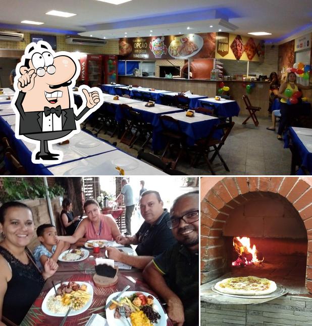 O interior do Diluga Pizzaria