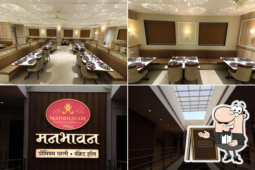 Manbhavan Premium Thali & Banquet Hall Dhule is distinguished by exterior and dining table