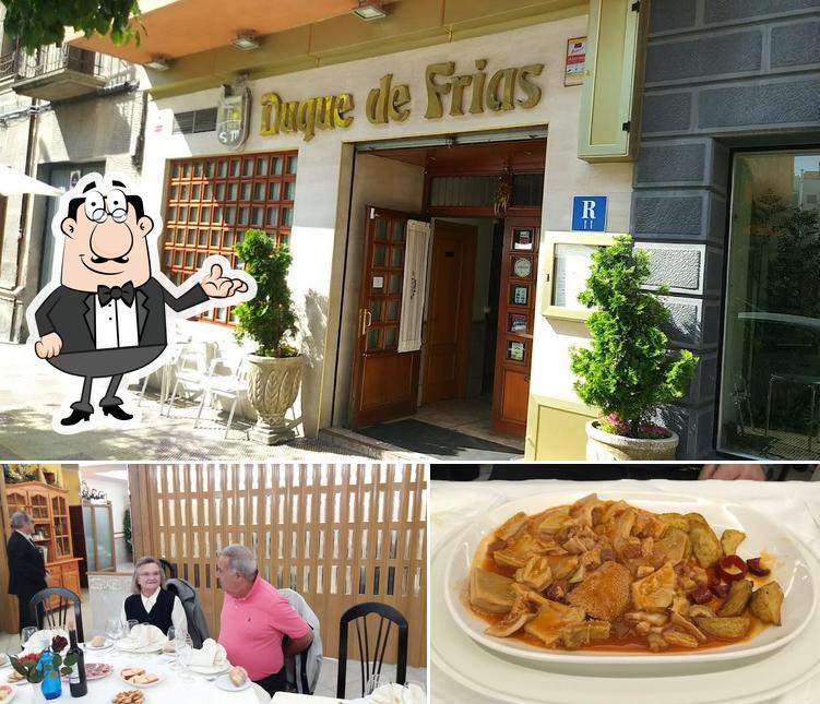 The photo of interior and food at Duque de Frías Restaurante