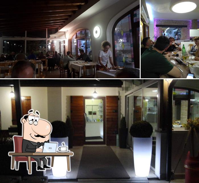 Pizzeria Da Volpe si caratterizza per la interni e bancone da bar