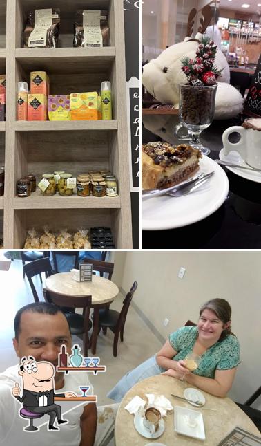 A ilustração da interior e mesa de jantar a Caramelle Café e Doceria