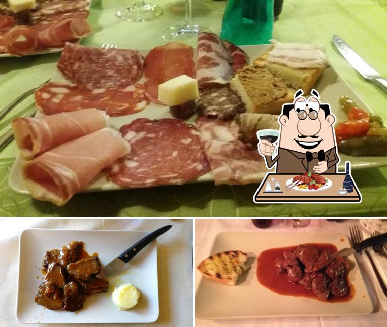 Ordina i piatti di carne a Osteria Dei Ghiotti