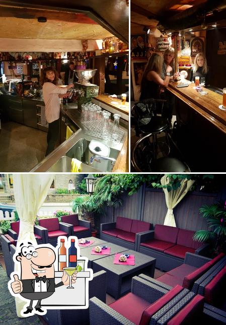 The photo of bar counter and interior at Club Inn