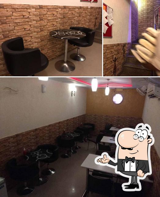 Take a seat at one of the tables at Pizza Freaker'z