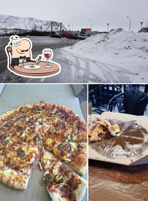 Las imágenes de comida y exterior en Domino's Pizza