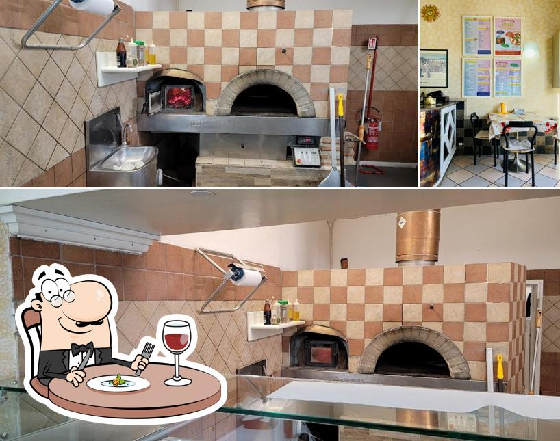 L’image de la nourriture et intérieur de Pizza Follia’s