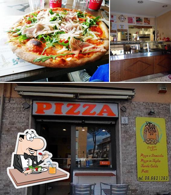 La foto della cibo e interni di Pizzeria 'Sta Pizza