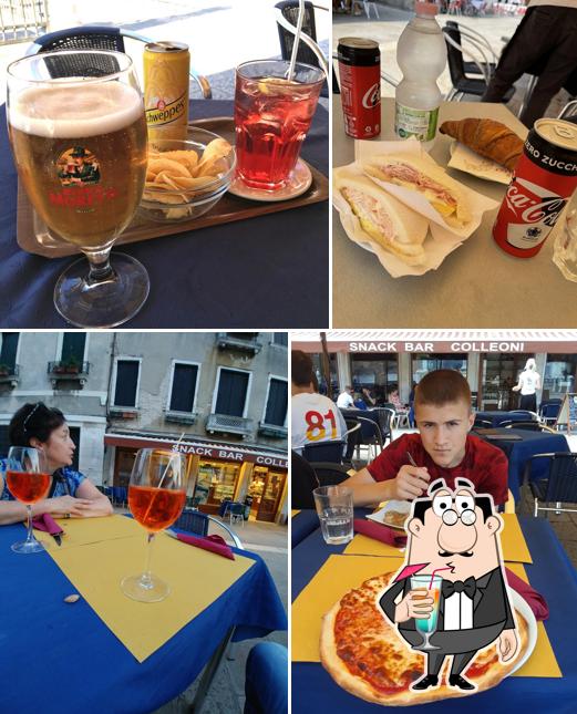 La immagine di bevanda e tavolo da pranzo da Snack Bar Colleoni