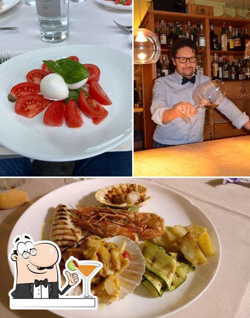 Estas son las imágenes que muestran bebida y comida en Ristorante al Campanile