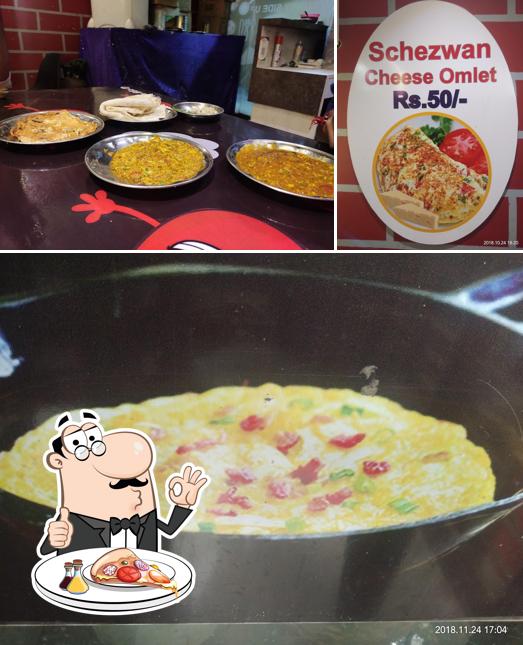 Try out pizza at Egg Adda