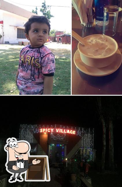 Among different things one can find exterior and beverage at Spicy Village - Best Veg & Non-Veg Food Restaurant, Best NON Veg Food Restaurant, Best Family Restaurant in Haridwar