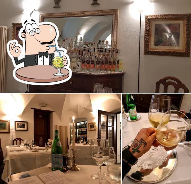 La foto di bevanda e interni da Ristorante Passerini